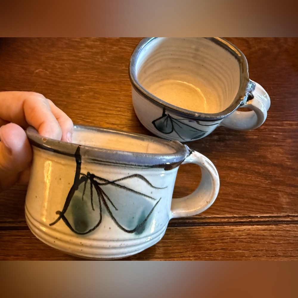 A Pair of Handcrafted Ceramic Mugs with Artistic Design Stamped JSB